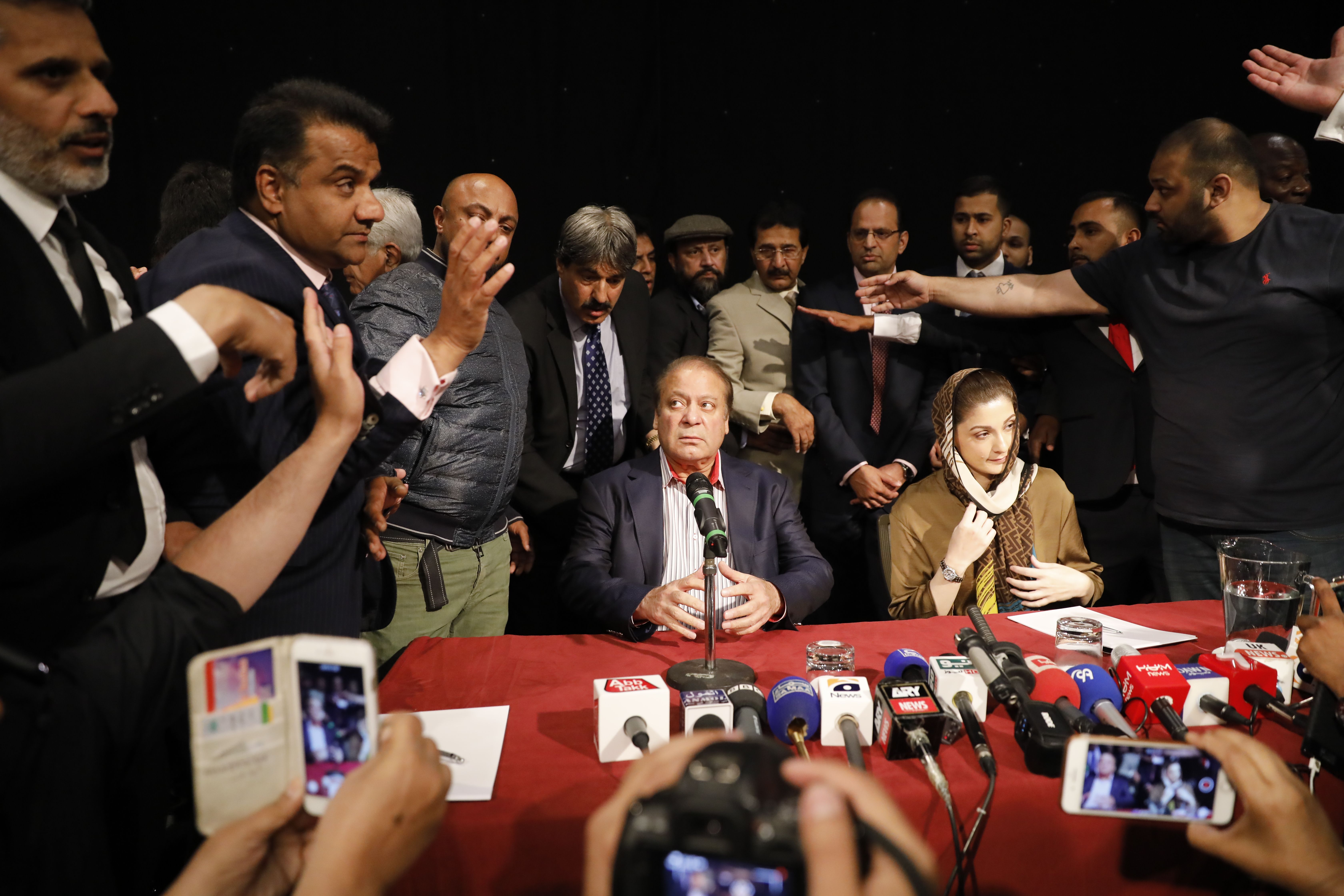 Sharif and his daughter Maryam Nawaz attend a United Kingdom PML-N Party Workers Convention meeting with supporters in London on July 11th, 2018. Sharif was sentenced in absentia to 10 years in prison by a corruption court in Islamabad, lawyers said, dealing a serious blow to his party's troubled campaign ahead of the July 25th elections.