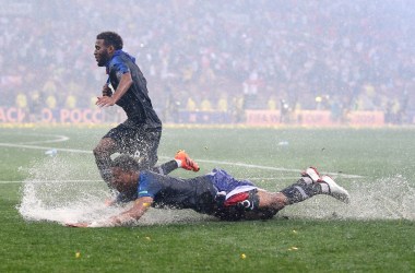 Presnel Kimpembe and Thomas Lemar of France celebrate in the rain after victory in the 2018 FIFA World Cup final between France and Croatia at Luzhniki Stadium on July 15th, 2018, in Moscow, Russia.