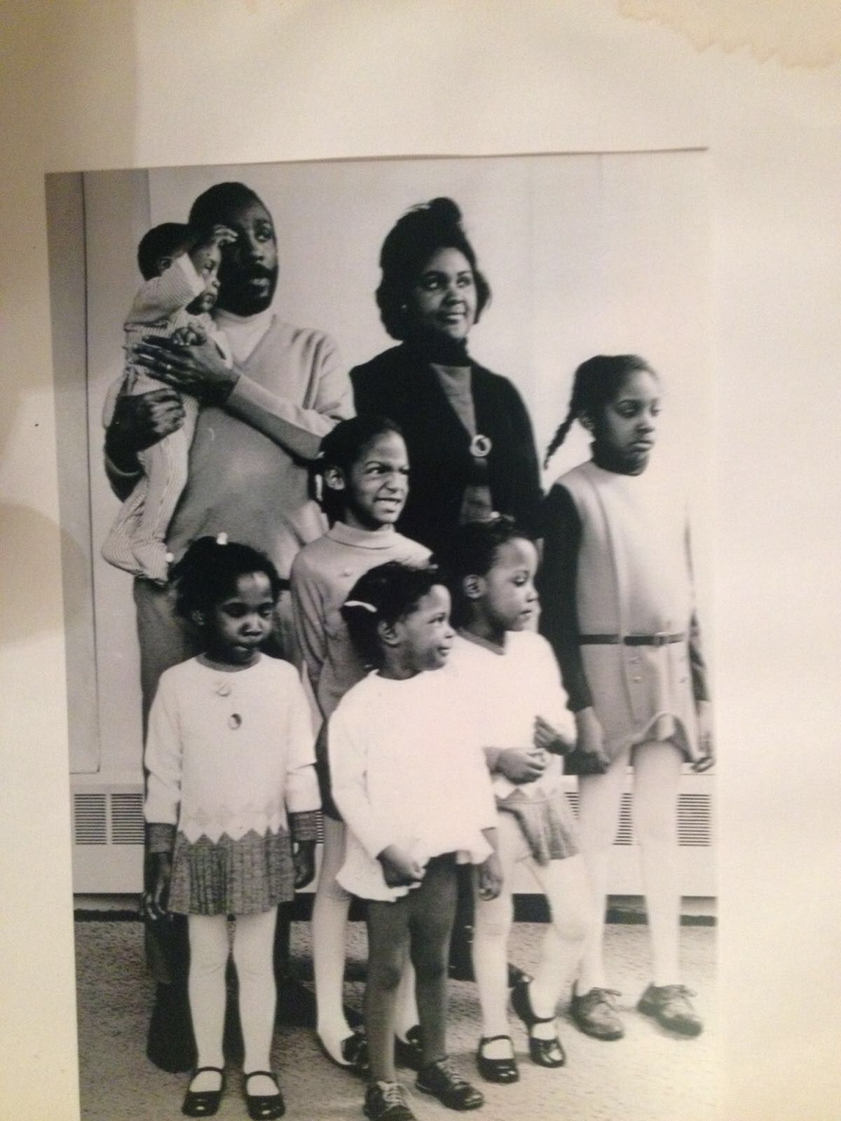 A young Gregory held by Dick Gregory in an undated family portrait.