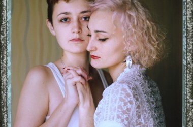 A posed portrait of lesbian couple O (27, right) and D (23, left): "After [men attacked us for being lesbians], I felt even more strongly how dear D is to me, and how scary the thought that I could lose her. The worst thing that I felt was an absolute inability to protect the one I loved, or even myself. Yes, now I look back on the street and look at every passing male as a possible source of danger. I realized that there are defective people who can pounce on us just because we are lesbians. But every time, now when I'm in the street, when I take her by the hand, I do it consciously, it is my choice. D, hold my hand, this is my reward for your courage."