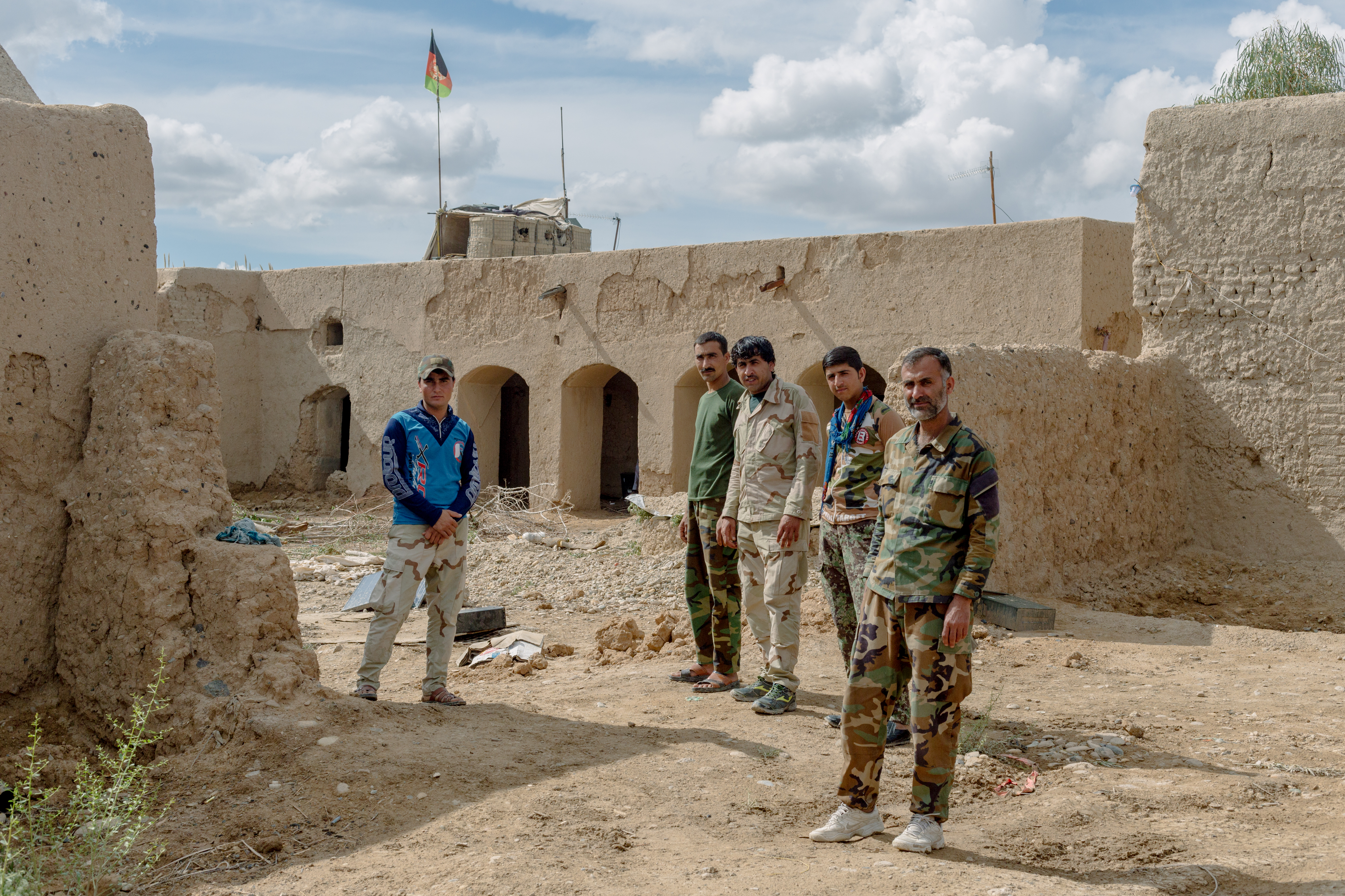 Afghan National Army soldiers stand inside their outpost in April of 2019. Manning an outpost is often dangerous, as the Taliban will sometimes amass their forces and overwhelm the handful of soldiers positioned there. The threat of insider attacks makes outpost duty even more harrowing.