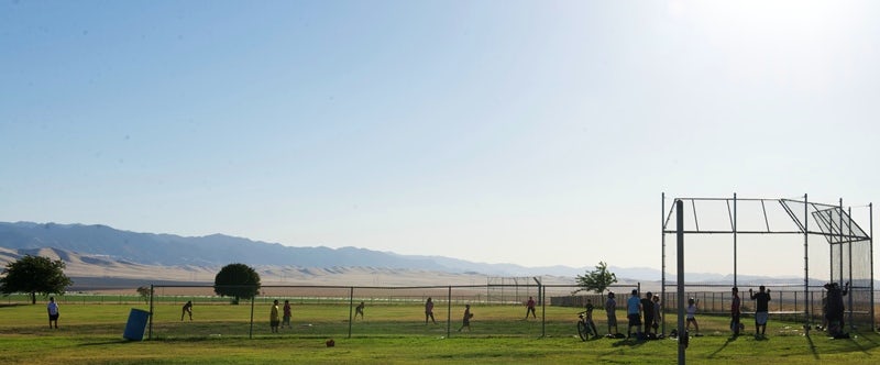 Children play at a ballfield at Reef-Sunset Middle School in Avenal, California. The school has had problems with water contamination from disinfectant byproducts and another school in the district has high levels of arsenic.