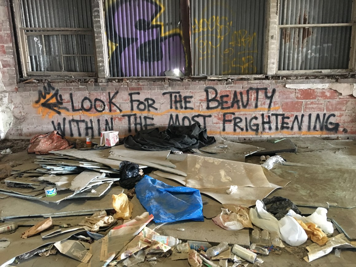 The inside of an abandoned warehouse on the northern end of downtown Houston hosts an encampment where approximately 20 homeless people stay each year.