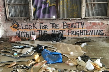 The inside of an abandoned warehouse on the northern end of downtown Houston hosts an encampment where approximately 20 homeless people stay each year.