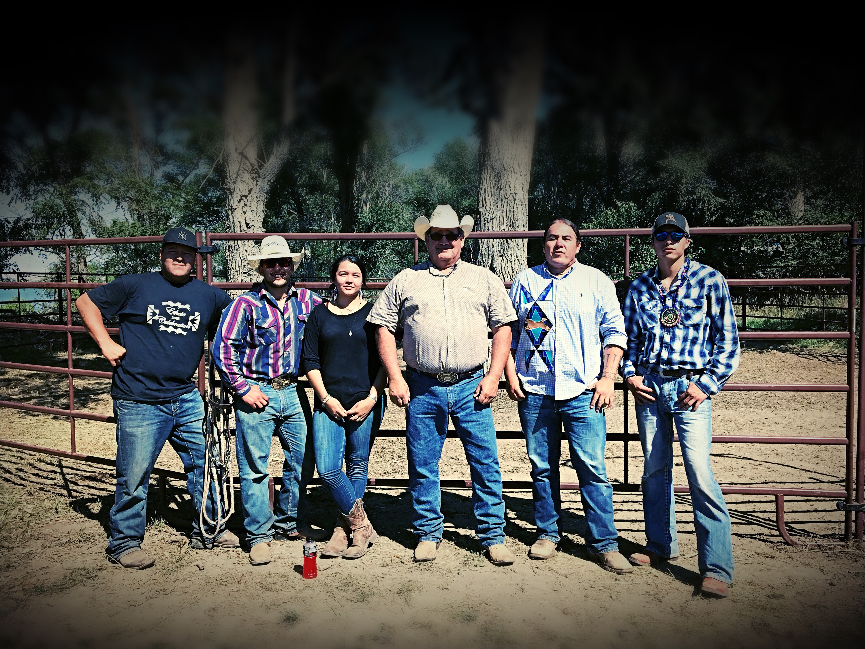 Left to right: Donny Hughes, Mason Redwing, Tea McGinnis, Dave Valandra, Greg Grey Cloud, and Isaiah Knife at a horse nation exhibit at St. Joseph's Indian School in Chamberlain, South Dakota.