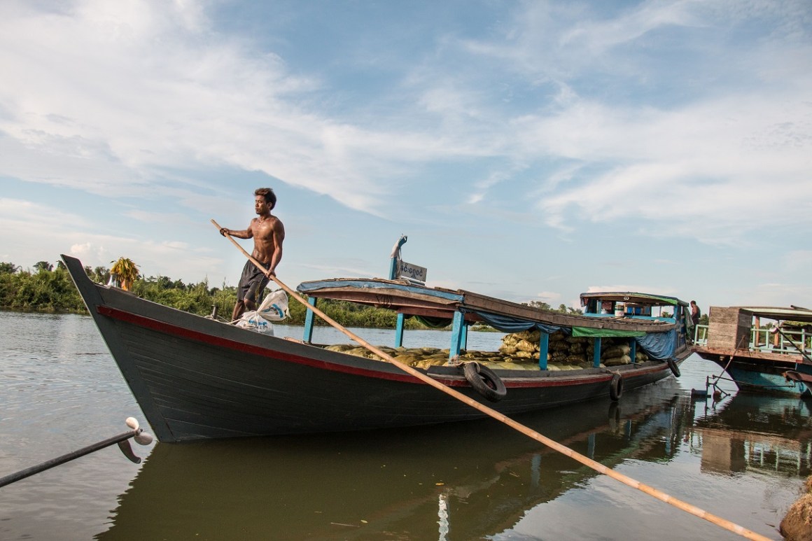 Charcoal bags waiting to be transported near Katha, Myanmar. The charcoal will be sent to Bhamo before going to China.