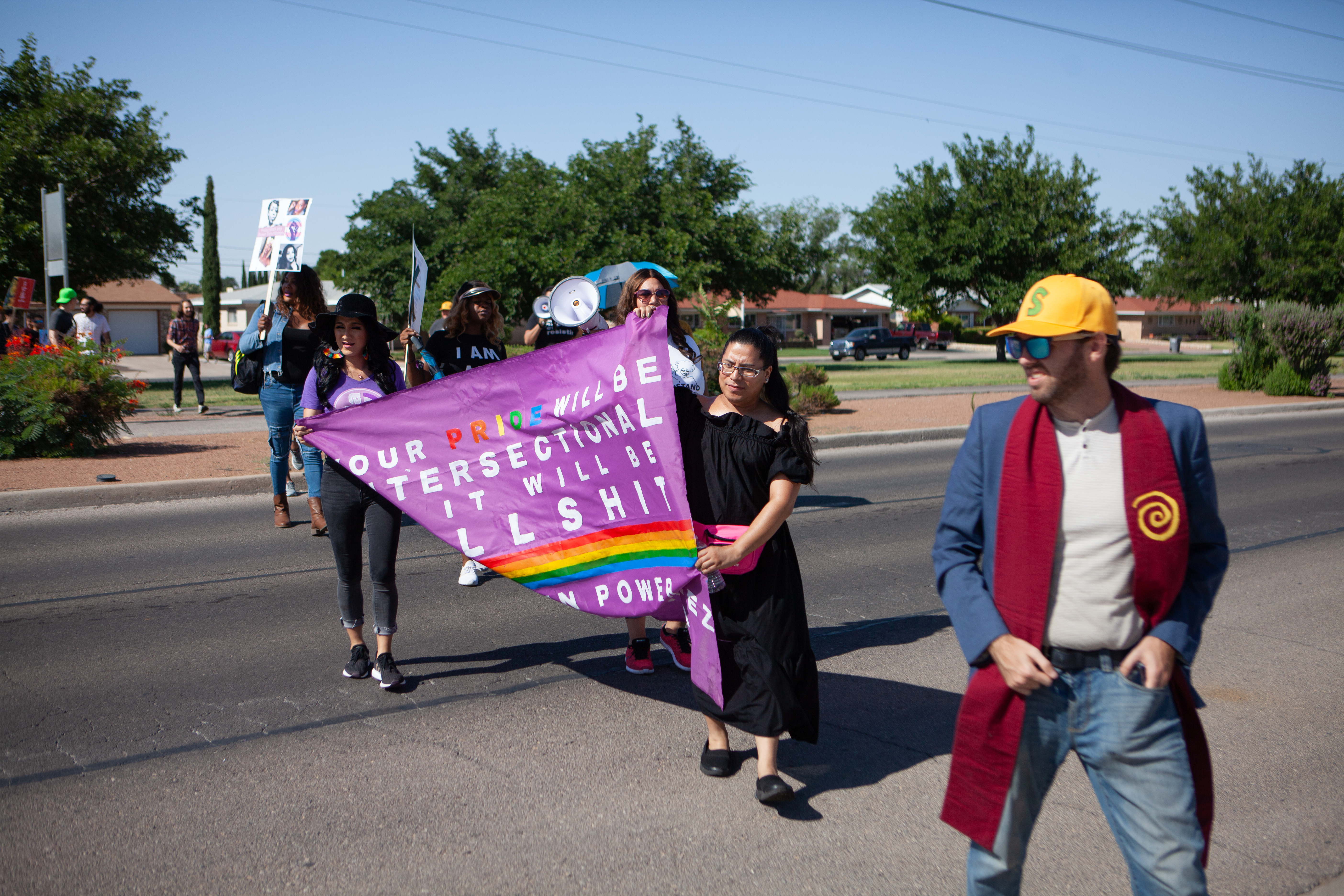 Protesters make their way through El Paso to the El Paso Processing Center, an ICE facility.