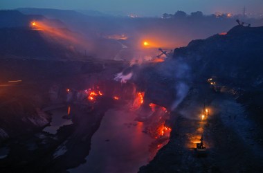 An underground fire, which locals say first started in an abandoned mine here in 1916, still burns as workers tap the remaining supply of coal.