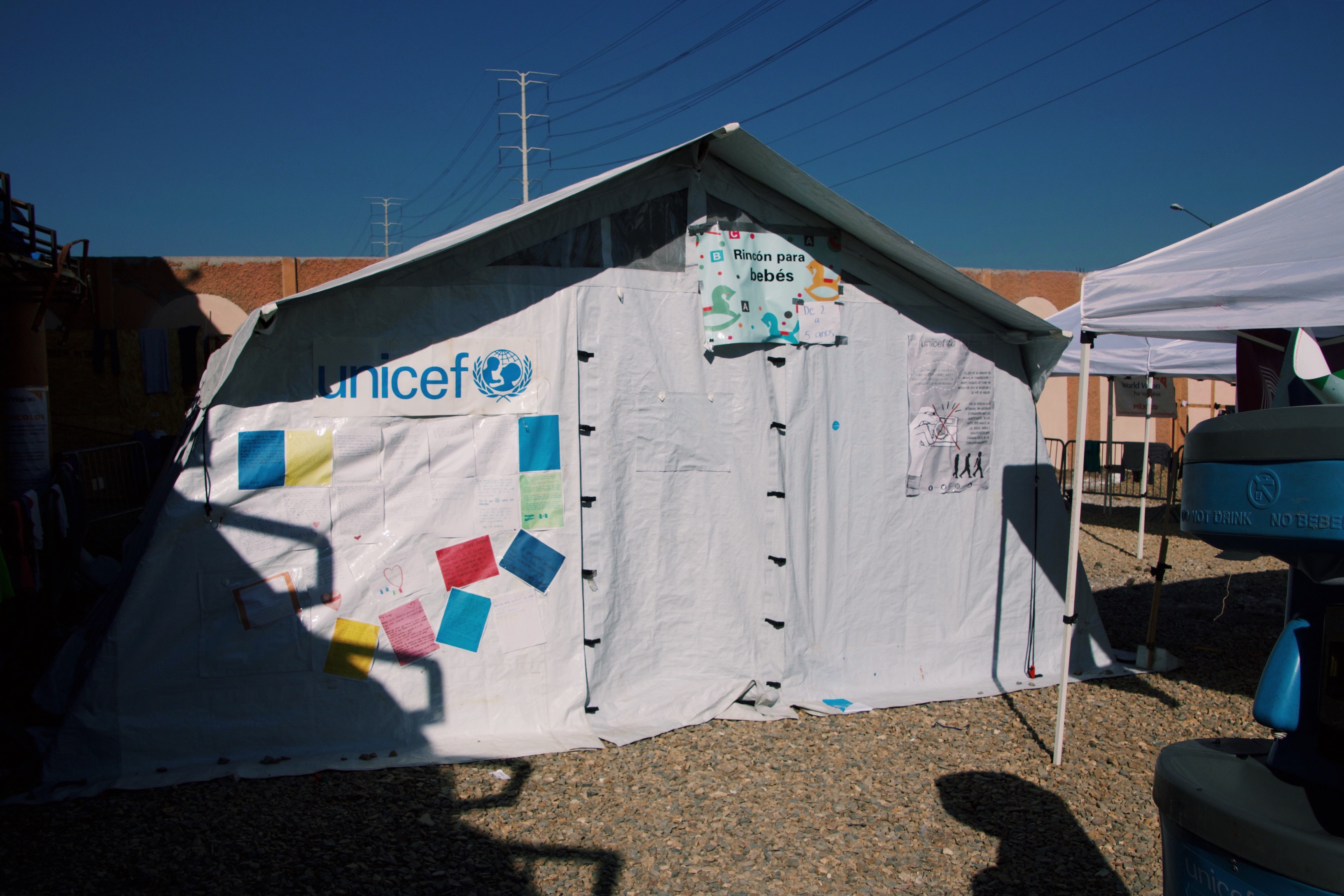 A UNICEF tent offers medical and psychological services to migrant children.