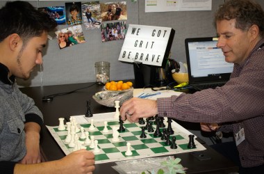 Jason Wasserman, a teacher, plays chess with an advisee. "It's all the underdogs," he says of students at SAVA.