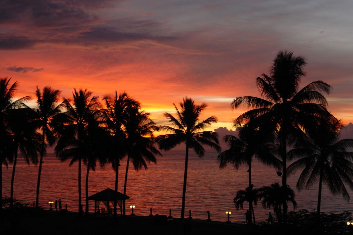 Tropical sunset over the sea in Kota Kinabalu, Malaysia.