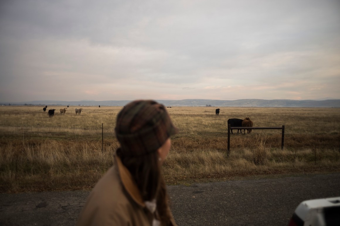 Breanna Owens looks over the livestock at her ranch in Los Molinos, California.