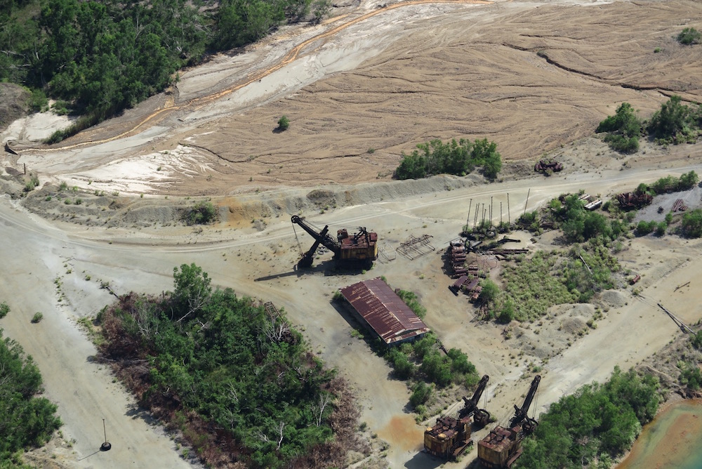 Abandoned equipment and toxic mine sludge occupy the abandoned Marcopper mine on Marinduque. A breach in the mine's tailing pond poured millions of tons of mine waste into the Boac River.