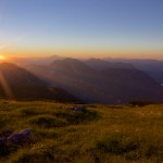 Sunset over the Hallstätter See in the Austrian Alps near Salzburg. Excavations near the lake show that people have lived here in relative harmony with the mountain environment since the late Bronze Age, more than 3,000 years ago. Now, climate change threatens the sustainability of mountain cultures in the region.