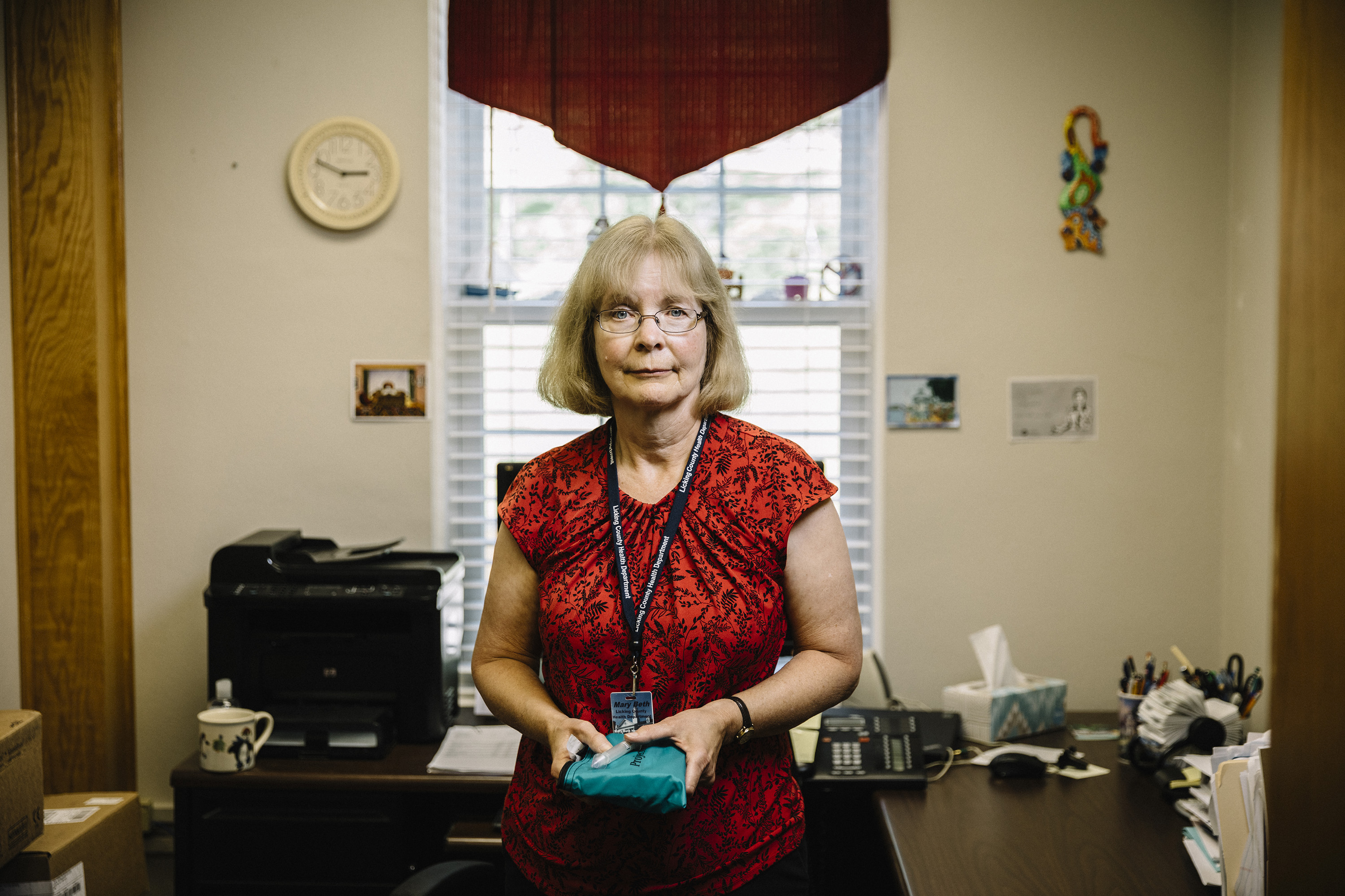 Newark, Ohio, September 5th, 2018: Nurse Mary Beth Hagstad holds a naloxone kit in her office at the Licking County Health Department.