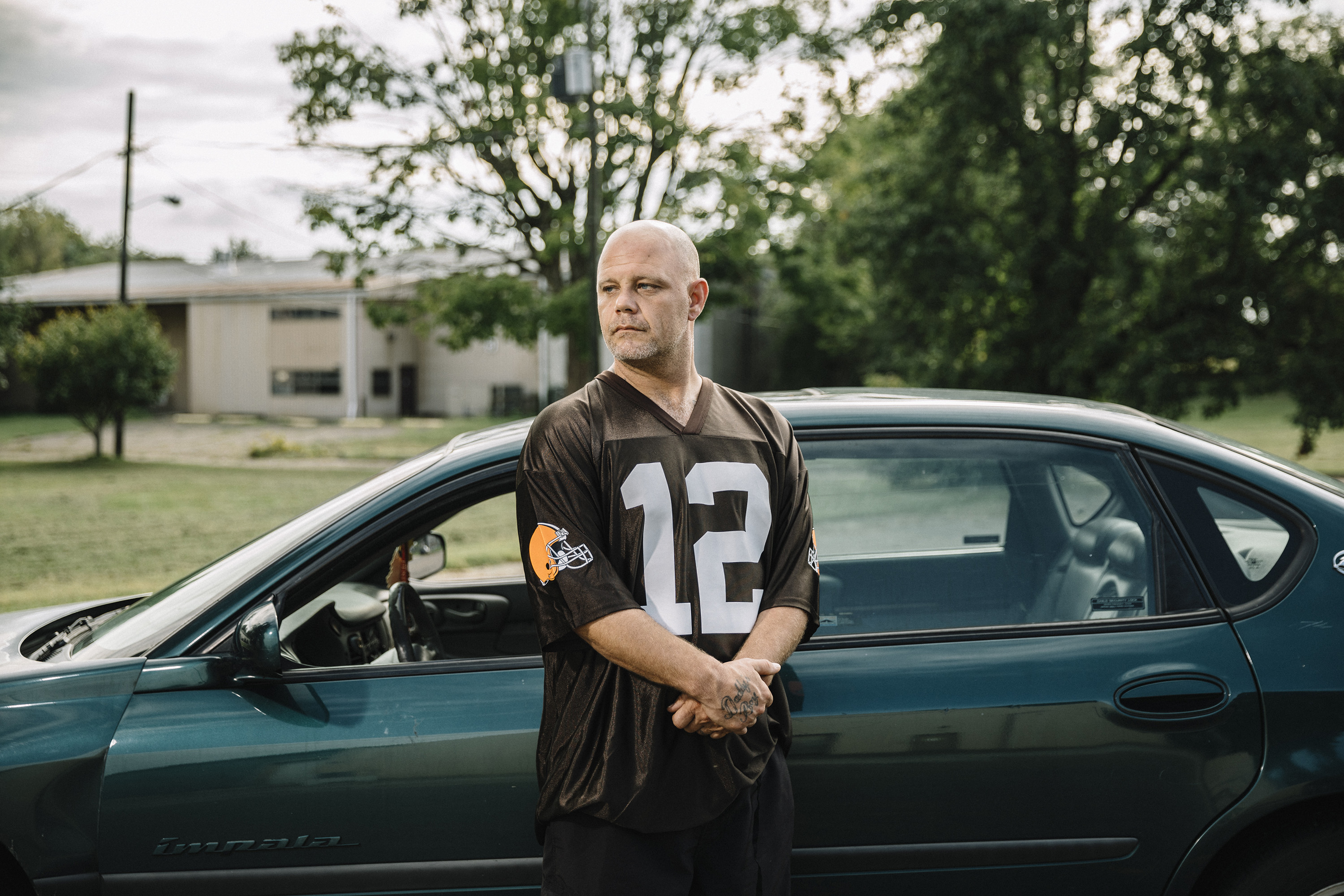 Newark, Ohio, September 6th, 2018: C.J. Wills stands in the parking lot of the Newark Church of the Nazarene on Maholm Street, where he once slept in his car after hitting rock bottom.