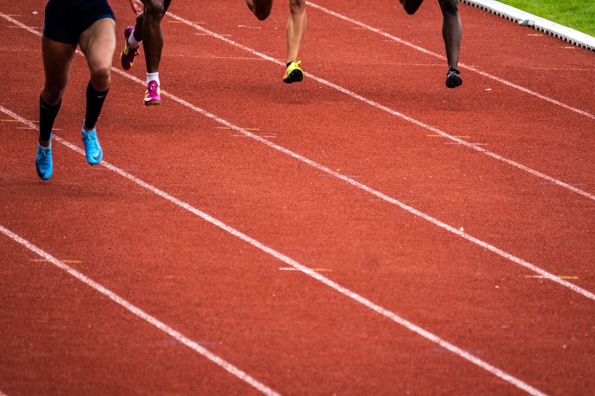 Women running on a track