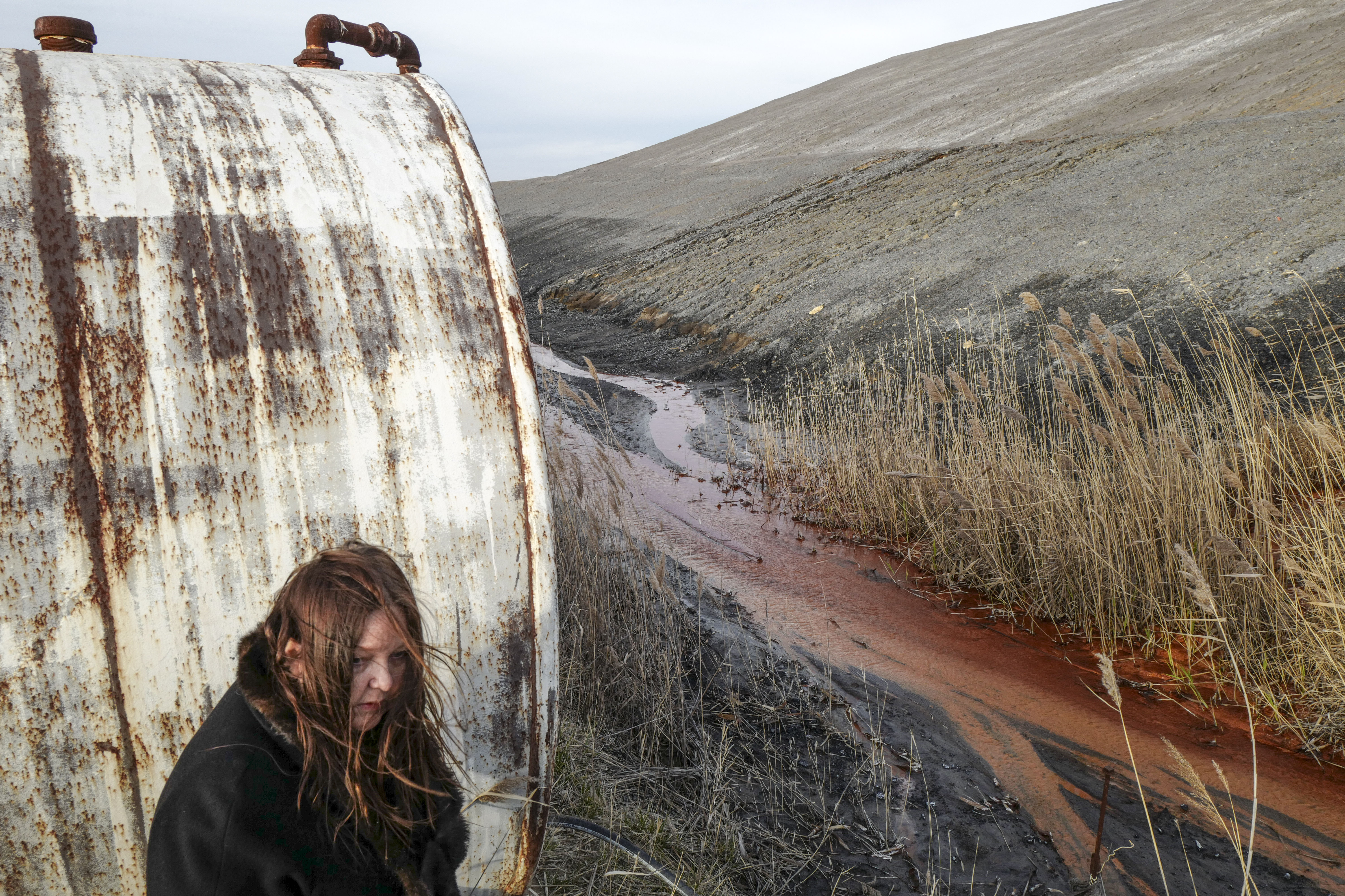 Georgia de la Garza, a local environmental activist in southern Illinois looks at Mercury run off by an active mine.