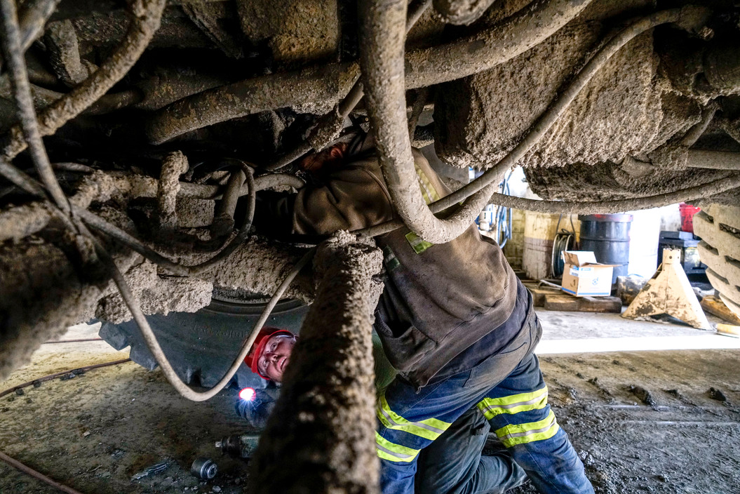 Repairs to a massive truck used to haul coal at the Eagle River Coal Mines.