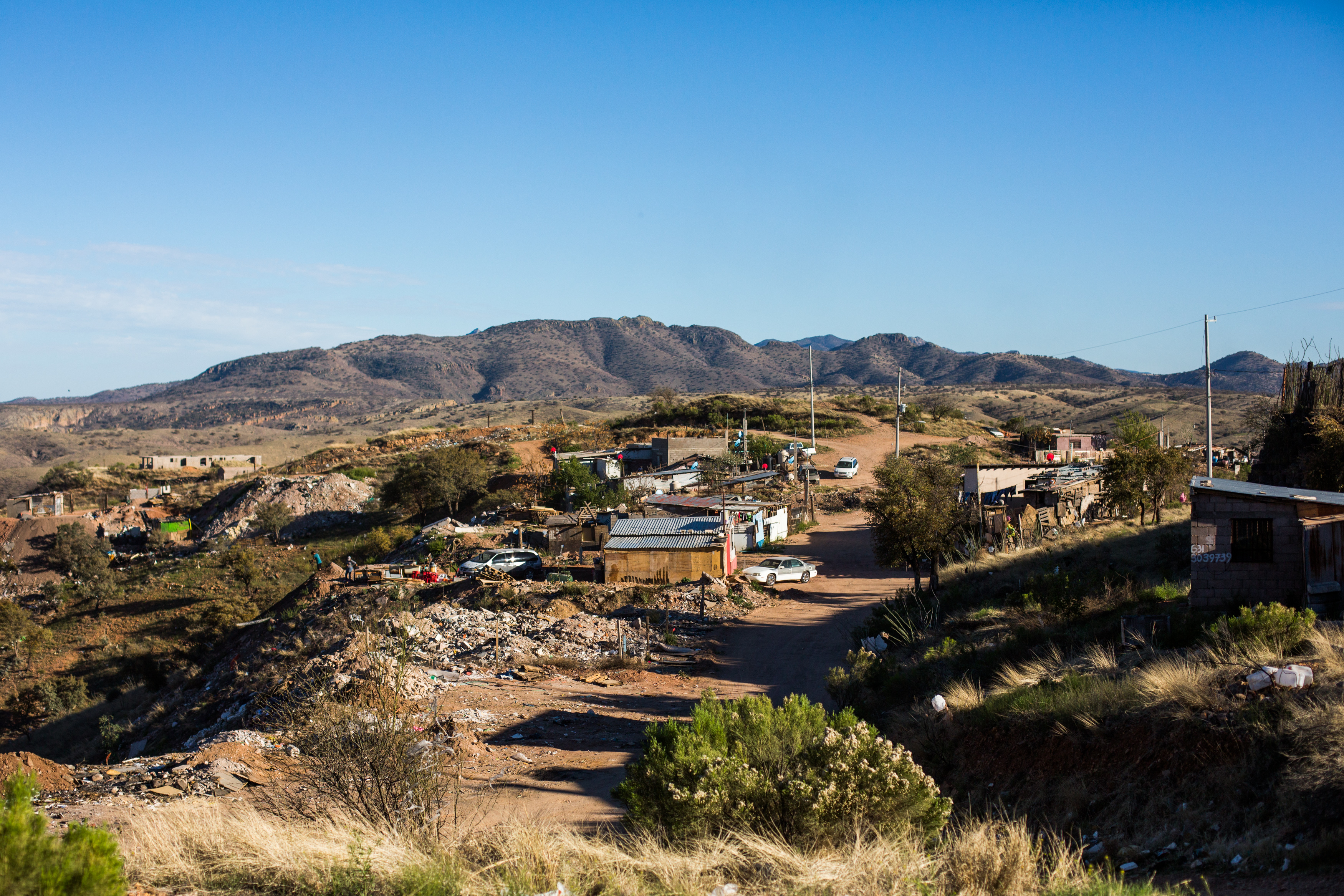 Rosarito II, a makeshift neighborhood in the outer hills of Nogales, grew out of an old dump. The unclaimed, refuse-strewn land is a popular place for recent deportees to settle, including Panchito. With very little commercial value, no one complained as new residents began to move in.