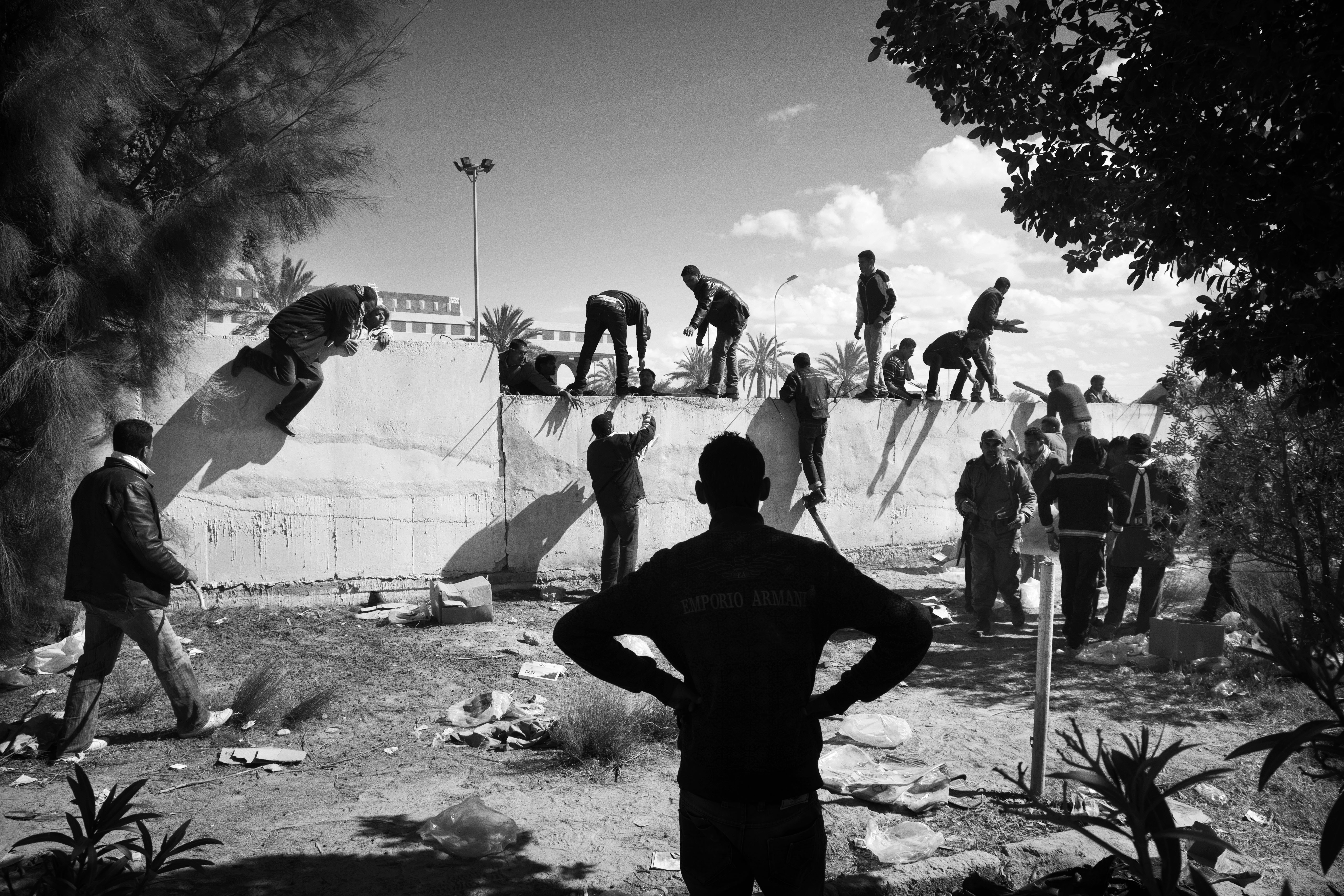 Ras Ajdir, Libya, 2011: People cross the border from Libya into Tunisia during conflict between rebels and pro-Muammar el-Qaddafi forces.