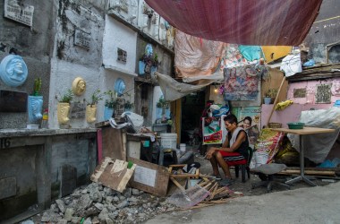 "Of course, I am mad about what happened to Ericardo. But what can I do?" asks Ricardo, sitting outside his home in Pasay cemetery.