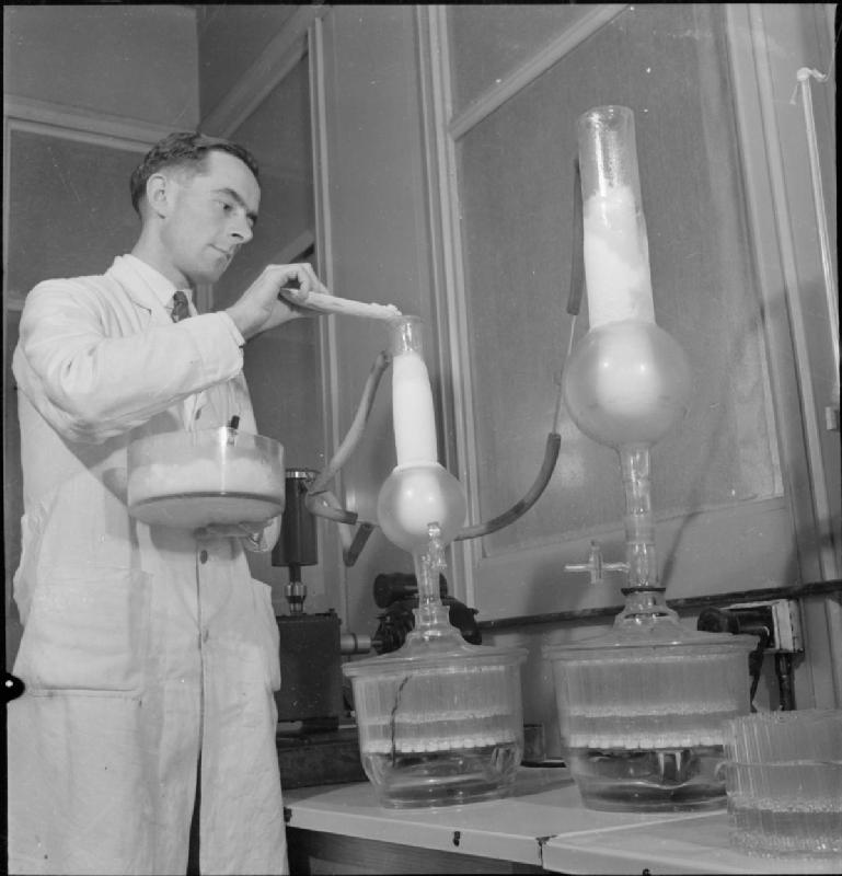 A technician preparing penicillin in 1943.