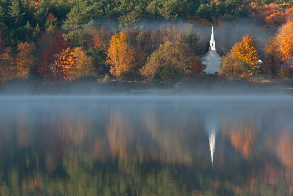 Church in nature on lake Christianity