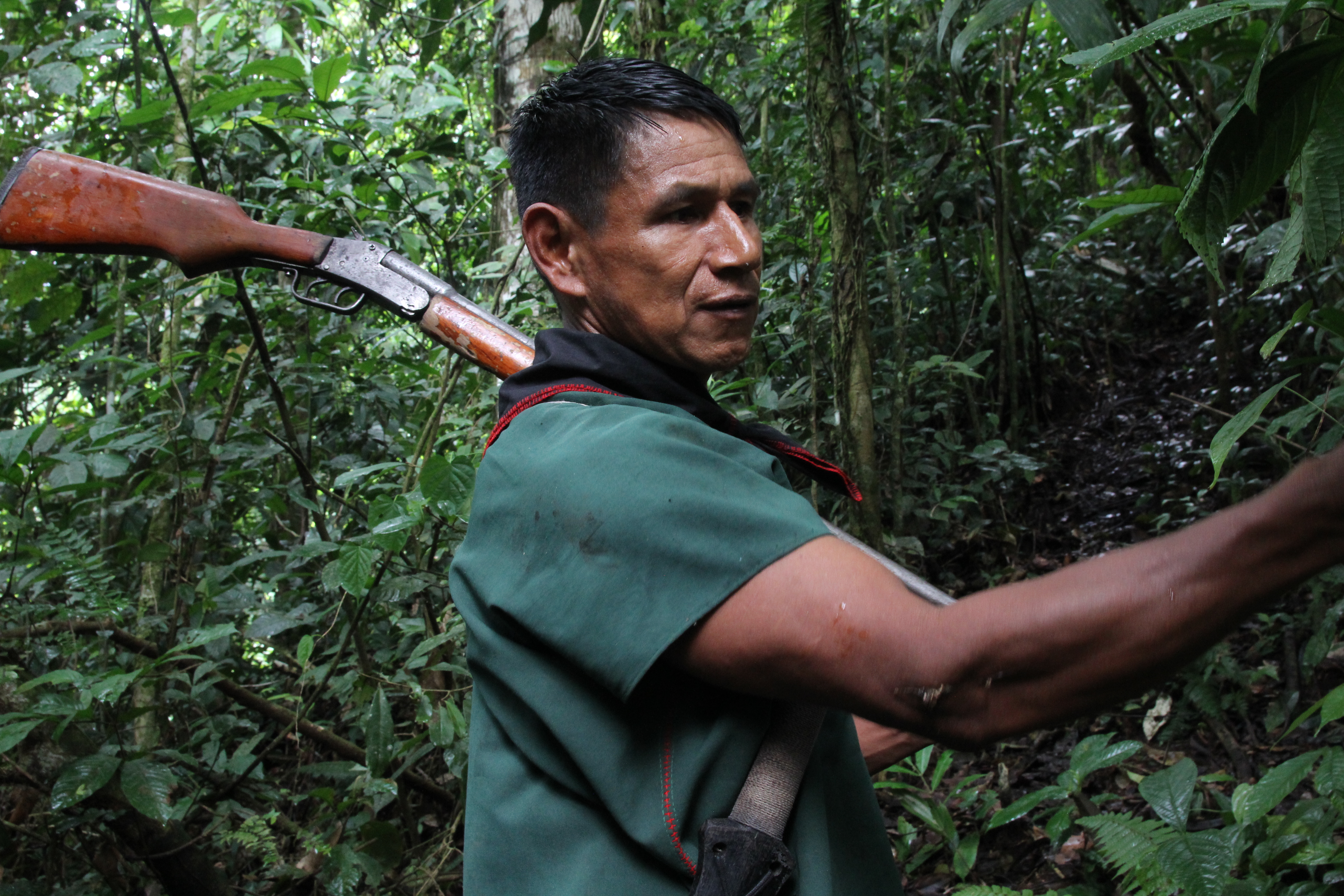 During a trek through the jungle, Viejo stops to point out some sap on a tree that’s good for lighting fires.