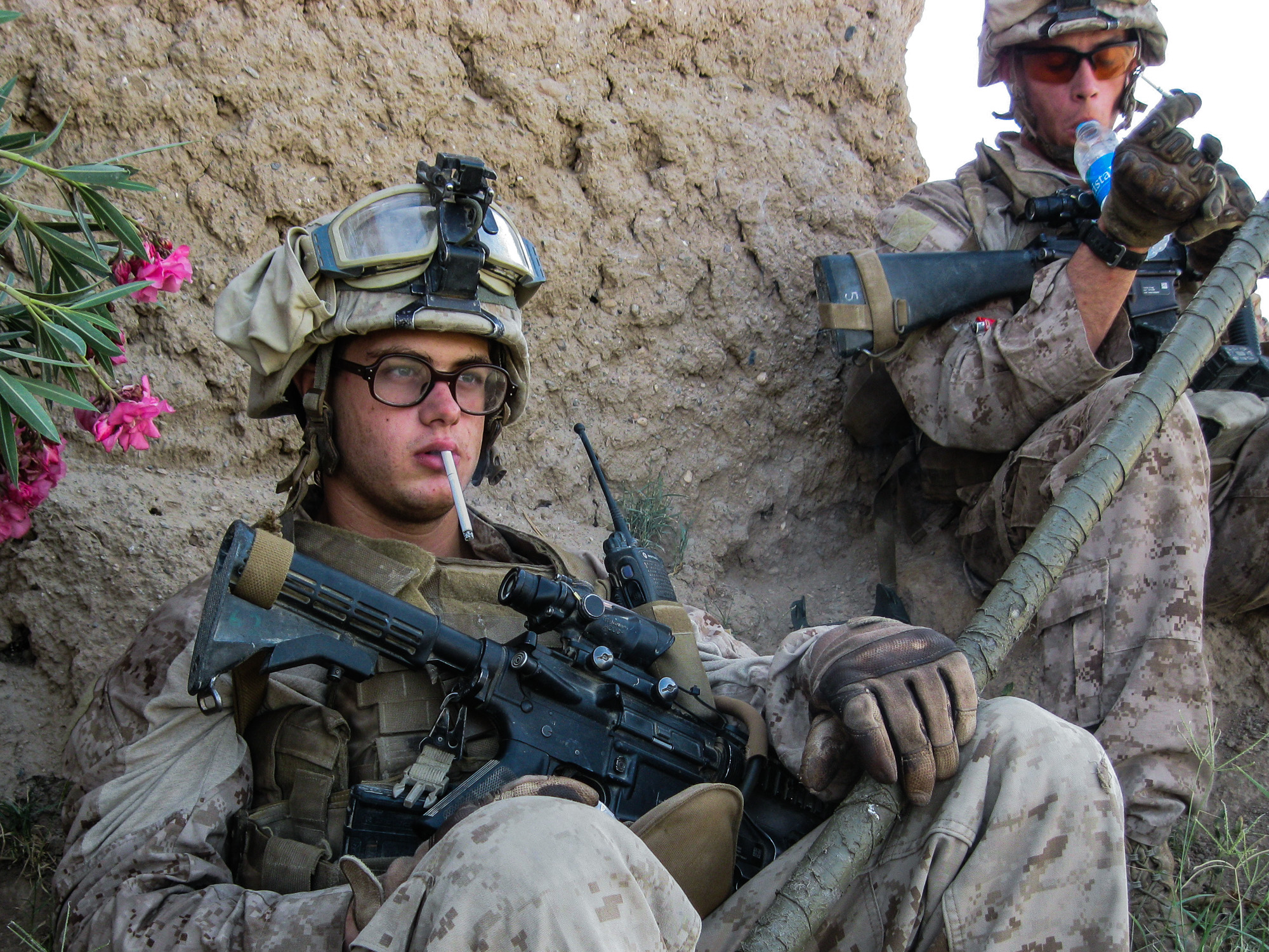 Marines from the author's squad rest during a patrol in Marjah in the spring of 2011.