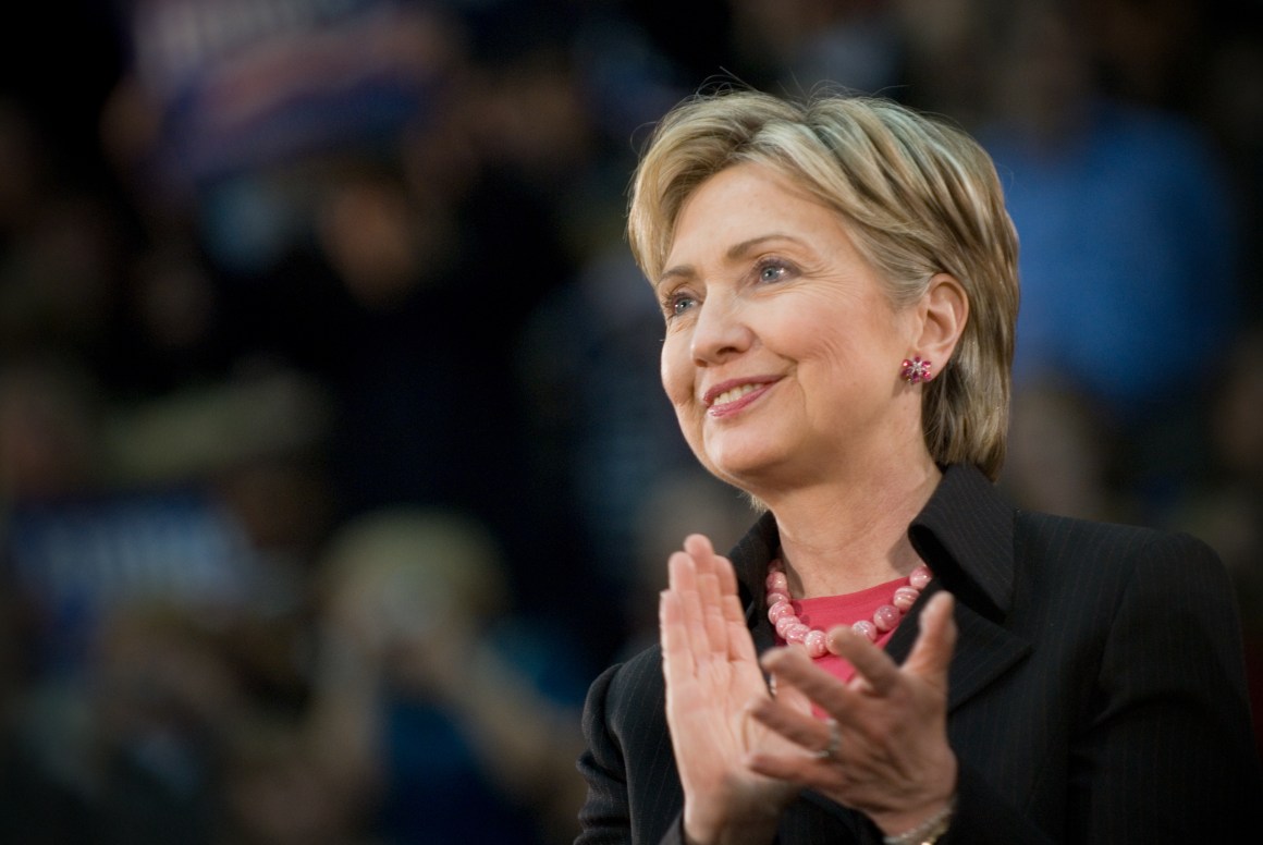 Photo of Hillary Clinton clapping.