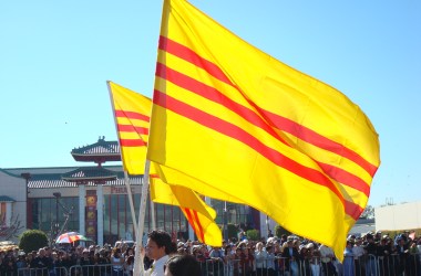 Vietnamese Americans marching with the South Vietnamese flag during the Vietnamese New Year.