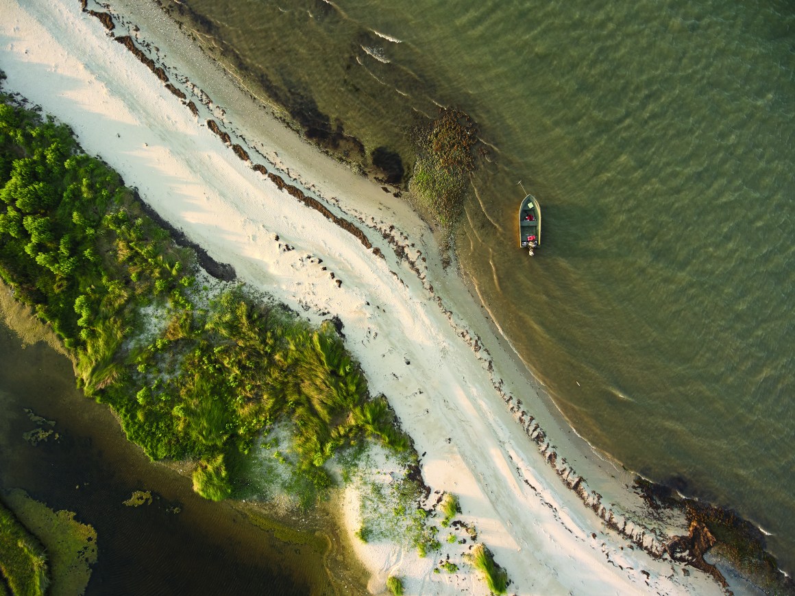 Waves lap the north coast of Tangier Island, an area known as Uppards that was inhabited until 1929. Grave markers of the local population's ancestors are regularly found on these eroded beaches.