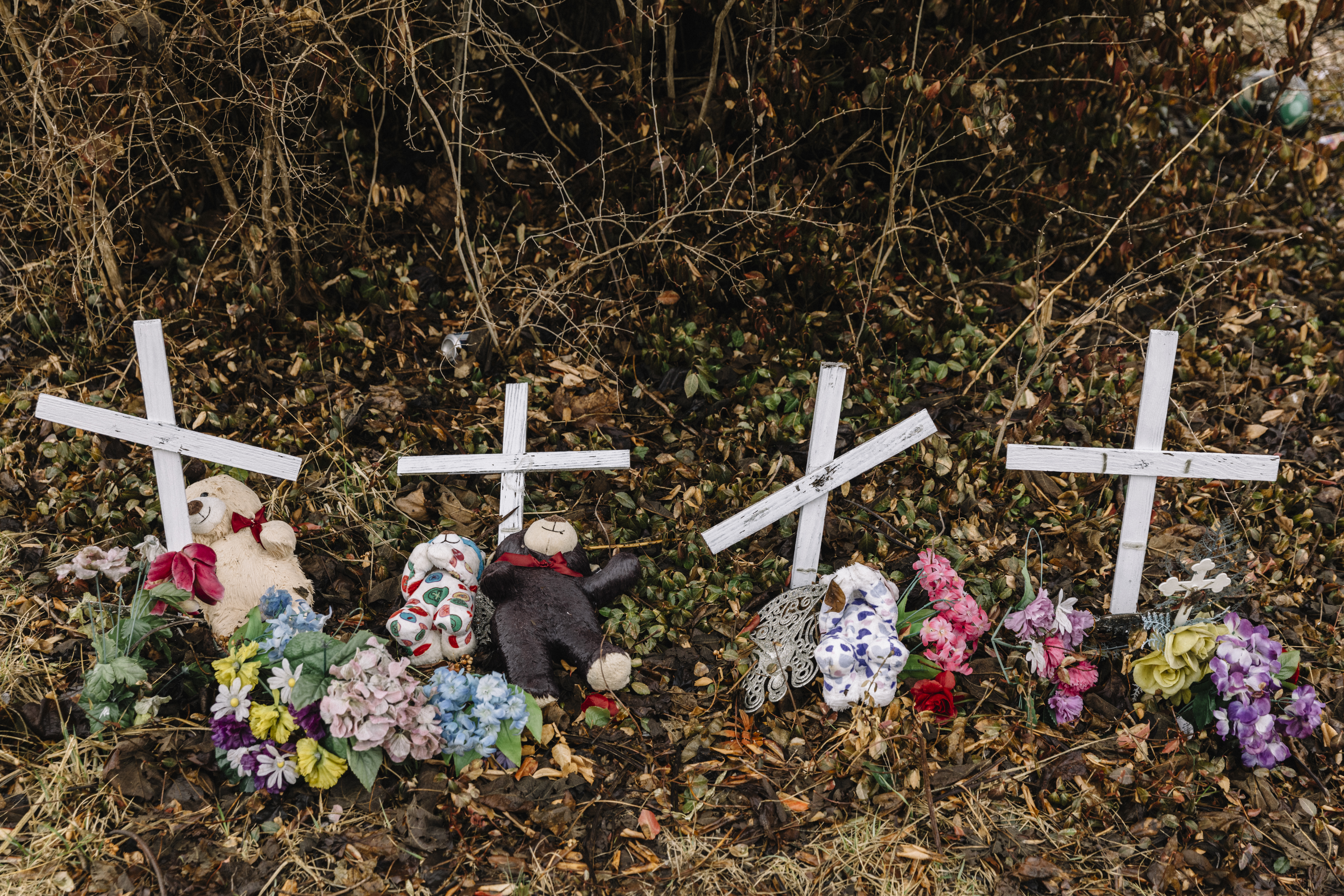 Small crosses on the edge of a small trailer park, located across the street from the grounds of the old American Zinc plant, which is now designated as a Superfund site by the EPA, in Fairmont City, Illinois.